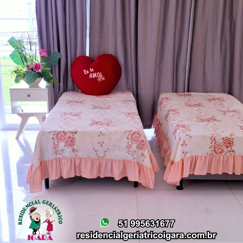 Quarto compartilhado feminino com decoração acolhedora no Residencial Geriátrico Igara em Canoas casa de repouso para idosos. fotos casa de repouso canoas